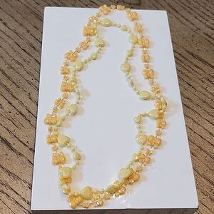 Kids play necklaces orange and yellow